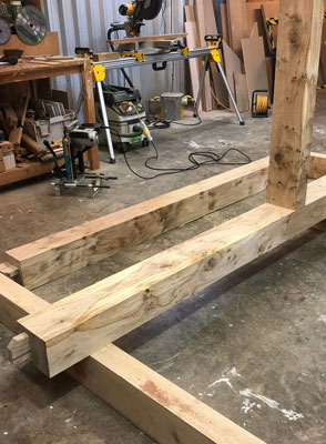 bespoke oak garden room frame being manufactured  