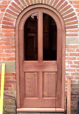 Installing a new arched timber door with two glazed panels