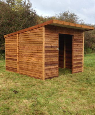 shelter for horses in field