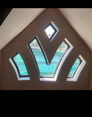 Unique fixed loft window retaining exterior facade features