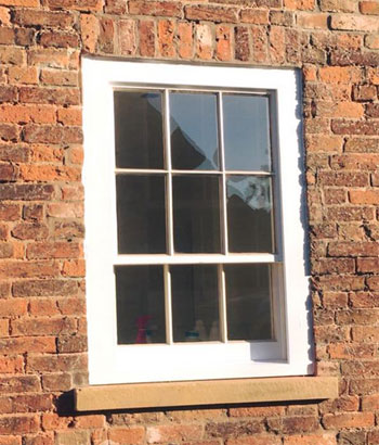 Small unequal opener timber sash window